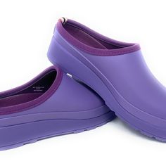 Durable Clog: Featuring A Round, Closed Toe Design, A Platform Heel, Durable Rubber Upper With Matte Finish, And Hunter Logo On The Back. Quality Material: Crafted With A Rubber Upper, A Soft Textile Lining And Insole, And Are Set On A Non-Slip Rubber Outsole. Slide-On Style: Slide-On Mule Construction As Well As An Open Back Makes Putting On And Taking Off A Breeze. Sturdy Support: Durable Clogs, Highly Resistant To Wear And Abrasion Feature A Cushioned, Textile Foot-Bed And Insole For All-Day Hunter Logo, Iridescent Purple, Hunter Shoes, Foot Bed, Women Hunters, Platform Heel, Soft Textiles, Toe Designs, Mule Clogs