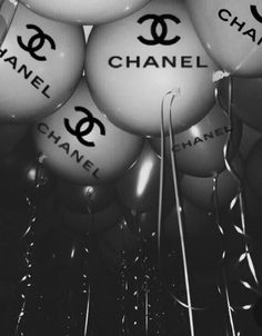 black and white photograph of chanel balloons