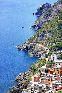 an aerial view of the town of positi on the amalfic coast