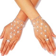 PRICES MAY VARY. Silver crystal gloves feature a unique ring and sparkling crystal, making your attire more charming and fashionable. Glitter gloves are suitable for most women. Their fabric fits very well, and the lace shows the curves of your hands, making you more attractive. Fashion hand chains with fashion style and rhinestones design, look very elegant and refined, make you more attractive in the eyes of others. Fingerless jewelry gloves can be used for masquerade parties, Halloween partie Crystal Gloves, Glitter Gloves, Rhinestone Gloves, Chain Crafts, Night Costume, Crystal Making, Hand Chain Jewelry, Prom Accessories, Arm Jewelry