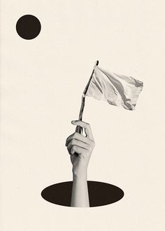 a hand holding a white flag in the air