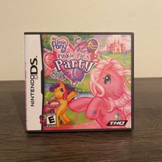 the pinkie pie party game for nintendo ds is shown in front of a white wall