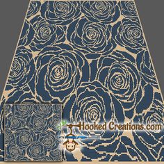 a blue rug with white roses on it