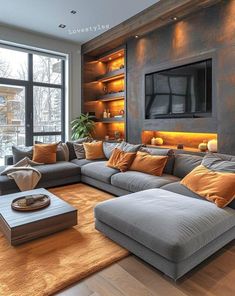 a living room filled with lots of furniture and a flat screen tv mounted on the wall