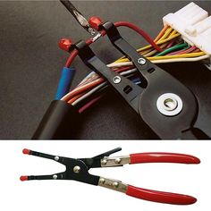 two pairs of pliers are shown with wires attached to the handles and sides of each pair