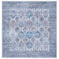 a blue and red rug with an intricate design on the bottom, in front of a white background