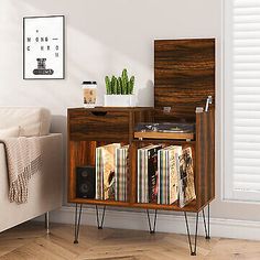 an entertainment center with record players and records