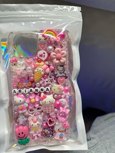 the case is filled with hello kitty charms