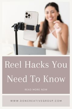 a woman holding a cell phone in front of her face with the text reel hacks you need to know