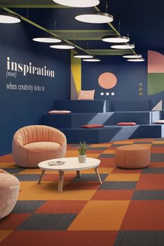 an office with colorful carpeting and furniture