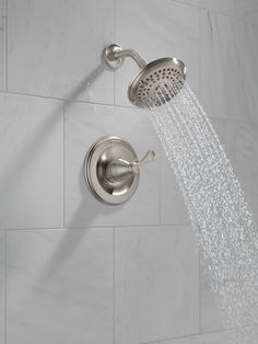 a shower head with water running from it