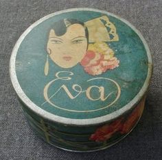 an old tin box with a woman's face on the lid and words go