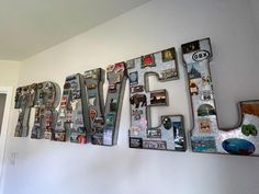 the word travel is made up of many different types of magnets and pictures on a wall