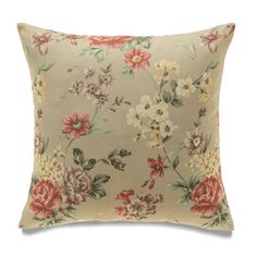 a beige pillow with flowers on it