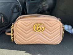 Turn heads and elevate your everyday style with the Gucci GG Marmont Mini Crossbody in a dreamy blush pink. This petite powerhouse is more than just an accessory; it's a statement piece that exudes luxury and timeless elegance. It is authentic and in great condition. I will send more pictures if requested. Gucci Gg Marmont Mini, Soho Disco Bag, G Letter, Gg Marmont Mini, Mini Chain Bag, Designer Crossbody Bag, Wash Label, Gucci Mini, Gucci Crossbody Bag