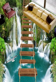 a living room with stairs leading to a waterfall