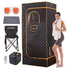 a woman standing next to a black portable shower with orange trimmings on it