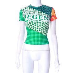 a mannequin wearing a green and white shirt with the word legen printed on it