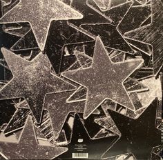 an image of five stars in the middle of some frosty glass pieces on a black background