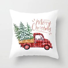 a red truck with a christmas tree on the back