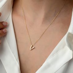 14k Gold Minimal V Letter Necklace, Letter Necklace, Gold Necklaces, 14k Gold Necklace, Necklace for Love, Necklace for Name ITEM DETAILS ❆ All our jewelleries are handmade with Love and Care 💓 ❆ Material: 14K Gold. ❆ Gram: 2,00 gr ❆ Each item is made to order. Since all of our products are handmade, there may be -) 10% deviation in the specified weight. ❆ DO YOU LIKE THIS RING? You can get more information about it below but if you have any questions, just send a message. PACKAGING ❆ They are 14k Gold Initial Pendant Necklaces For Anniversary, Minimalist 14k Gold Necklace For Anniversary, Minimalist Yellow Gold Necklace For Anniversary Gift, V Initial, Letter Necklace Gold, V Letter, V Necklace, Initial Necklace Gold, Letter V