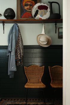 two chairs and a hat on a shelf