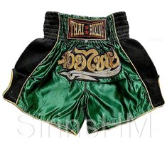 "Muay Thai Boxing Shorts with Thai word \"มวยไทย\" meaning \"Thai Boxing\" and Gold Thai Stripe The approximate sizes are as following (in inches): S waist 22-25 length 14.5 M waist 26-30 length 15 L waist 30-32 length 15.5 XL waist 32-34 length 16 XXL waist 34-36 length 1ุ6.75 XXXL waist 36-40 length 17.25 All items are handmade from Thailand so please allow us 7 business days before ship out. International orders will be shipped with registered Thai airmail delivery which takes 7-14 working da Drag Ideas, Thai Boxing Shorts, Muay Thai Gloves, Boxing Clothes, Muay Thai Shorts, Boxe Thai, Thai Words, Thai Boxing, Boxing Shorts