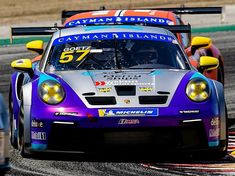 a racing car driving down a race track