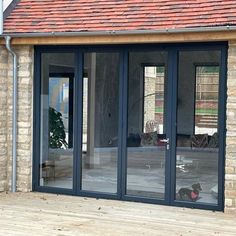 metal-folding-patio-door-clear-glass-4-panels Steel Patio Doors, Bifold Patio Doors, Glass Bifold Doors, Wrought Iron Entry Doors, Bifold Door, Iron Entry Doors, Bi Fold Door, Modern Entry, Door Sweep