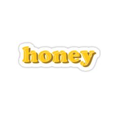 the word honey in yellow sticker on a white background with an orange and black outline