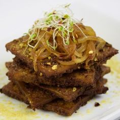 a white plate topped with food on top of a table