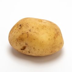 a close up of a potato on a white background with clippings to the side