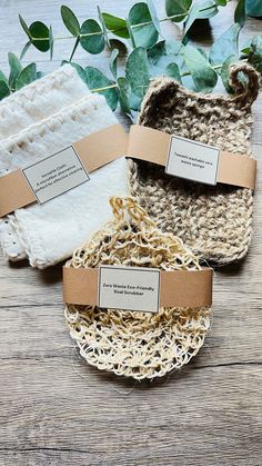 three pieces of woven fabric with labels on them