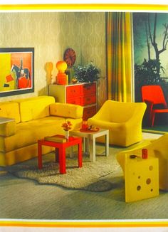 a living room filled with yellow furniture and decor