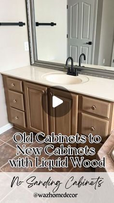 a bathroom vanity with a large mirror above it and the words old cabinets to new cabinets with liquid wood