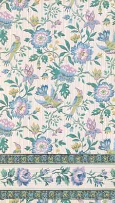 a floral wallpaper with blue, pink and green flowers on white stripes in the center