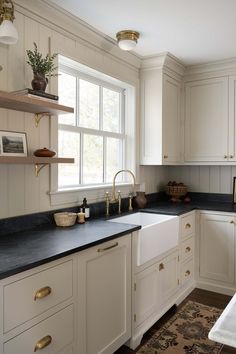 Taupe Cabinet Black Countertop, Ivory Kitchen Cabinets With Dark Countertops, Grey Mist Cabinets, Farm Sink Island Kitchen, Kitchen Backsplash Small Kitchen, New Kitchen In Old House, Cooper Hardware Kitchen, Ballard Designs Kitchen, Sherwin Williams Natural Choice Kitchen Cabinets