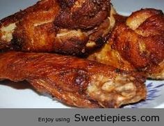 three pieces of meat sitting on top of a blue and white plate with the words sweetlips com written below it