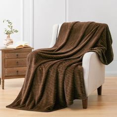 PRICES MAY VARY. 300GSM BROWN THROW BLANKET - Different from other Brand, This Vessia luxurious brown blanket is made of Real 300 GSM microfiber, which would bring super soft cozy touch and warm comfy feeling. FUNCTION - The brown Christmas Throw Blanket could be for many purposes. With the warm blanket you could lie on the couch on a snowy night, Watching TV, Reading a book or having a lovly talk with your family. For Camping, traveling, business trip or picnic, you could also take a flannel bl Brown Throw Blanket, Brown Blanket, Stripes Pattern Design, Striped Throw Blanket, Sofa And Bed, Christmas Throw Blanket, Couch Throw Blanket, Blanket For Couch, Striped Throw