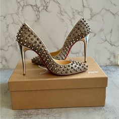 Pre-Owned Authentic Cristian Louboutin Follies Spikes 100 Glitter Pumps Size 36.5 Color Silver. Silver Tone Hardware Specchio Leather Hand-Placed Metal Spikes Pointed Toes Stiletto Heels Heel Height 100mm / 4” Leather Insole And Lining Some Signs Of Use As Shown In Photos Includes The Original Box, Dust Bags, 1 Set Of Replacement Heel Tips And Replacement Spikes Sparkle Louboutin Heels, Silver Louboutin Heels, Glitter Louboutin Heels, Rhinestone Louboutin Heels, Silver Christian Louboutin Heels, Metal Spikes, Glitter Pumps, Louboutin Shoes, Christian Louboutin Shoes