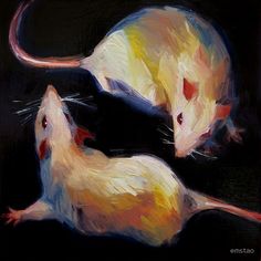 two white mice sitting next to each other on top of a black surface with red and yellow accents