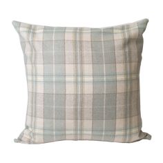 a plaid pillow on a white background