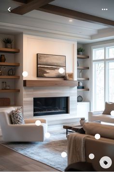 a living room filled with furniture and a fire place in front of a large window