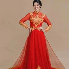 Voan, Chiffon Description Brand New High Quality Vietnamese Wedding Ao Dai With Red Pants. Fast/Free Priority Shipping (1-3 Days Delivery) Via Usps. Size Bust Waist S 32in/81cm 26in/66cm M 33in/84cm 27in/69cm L 35in/89cm 30in/76cm Xl 37in/94cm 31in/79cm 2xl 39in/99cm 35in/89cm 3xl 40in/102cm 36in/91cm 4xl 43in/109cm 37in/94cm 5xl 44in/112cm 38in/97cm 6xl 45in/114cm 40in/102cm Ao Dai Length Is 56-57in Pants Length Is 44in Please Provide Bust, Waist, Biceps And Hip Measurements When Placing Your O Organza Wedding Dresses With Gold Embroidery, Long Sleeve Wedding Gown With Gold Embroidery, Red Long Sleeve Organza Dress, Red Organza Floor-length Gown, Red Floor-length Organza Gown, Wedding Dresses With Gold Embroidery In Red, Red Wedding Dresses With Gold Embroidery, Long Sleeve Red Gown With Intricate Embroidery, Red Long Sleeve Gown With Intricate Embroidery