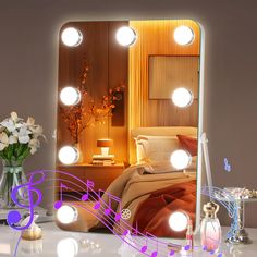 a mirror with lights and music notes on it in front of a bed that is illuminated