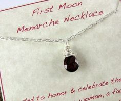 a card with a necklace on it that says first moon menache necklace tied to honor and celebrate the woman, for whom she is