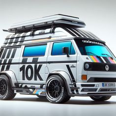 the volkswagen van is designed to look like it has been painted with rainbows and black stripes