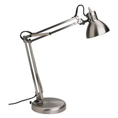 a metal desk lamp on a white background with clippings to the light bulb