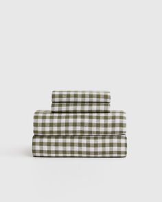 three green and white checkered sheets on top of each other