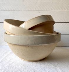 three bowls stacked on top of each other